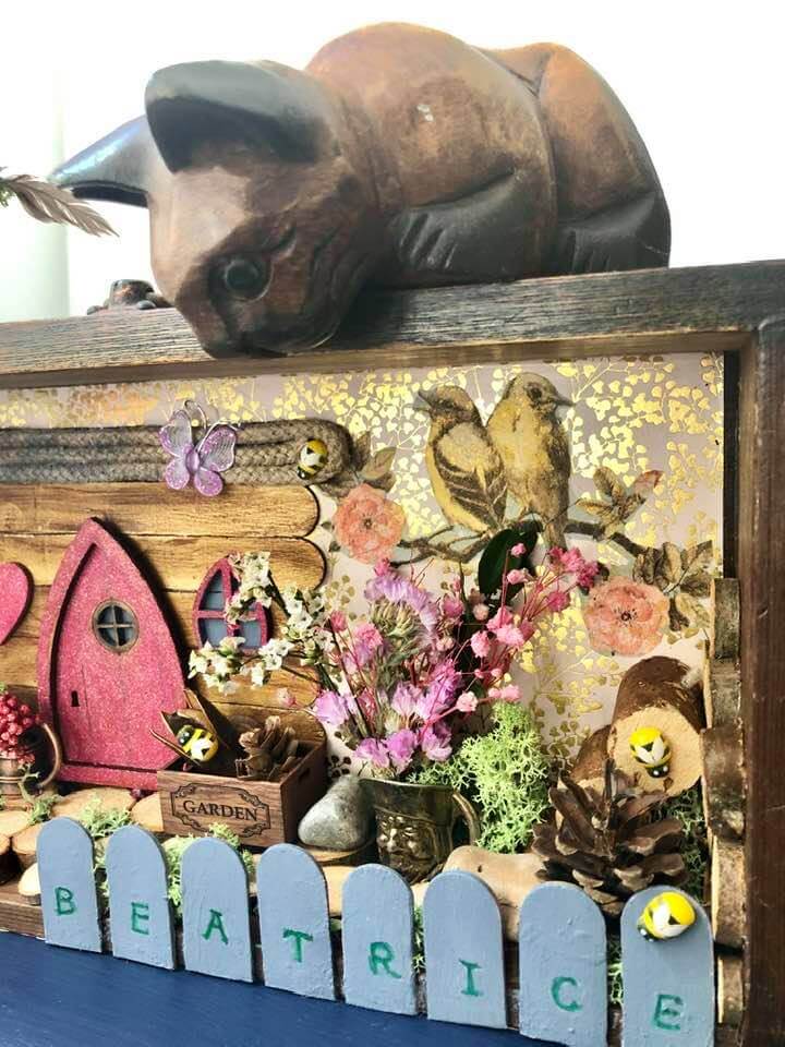 "Garden in a drawer" cat on top by Emma Mullender