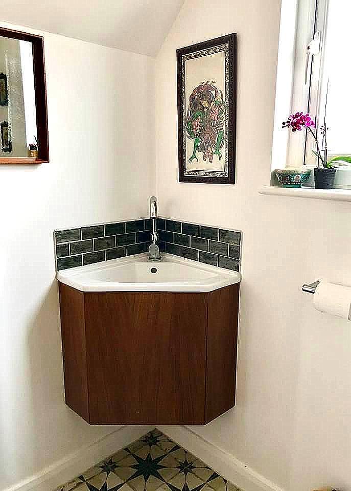 "Guest Shower Room interior styling" Bespoke cherry wood wall mounted vanity unit and art by Emma Mullender