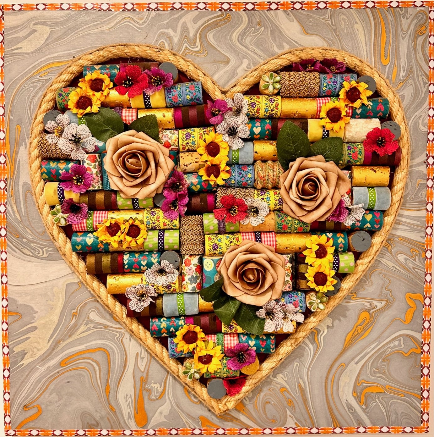 "Love heart assemblage" made with corks, ribbons and flowers, by Emma Mullender